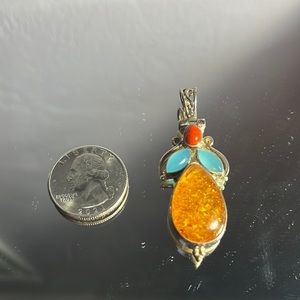 AMBER, CORAL, AND AGATE PENDANT
